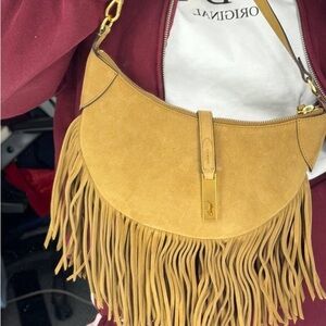 POLO RALPH LAUREN
Leather hobo bag with accent fringe